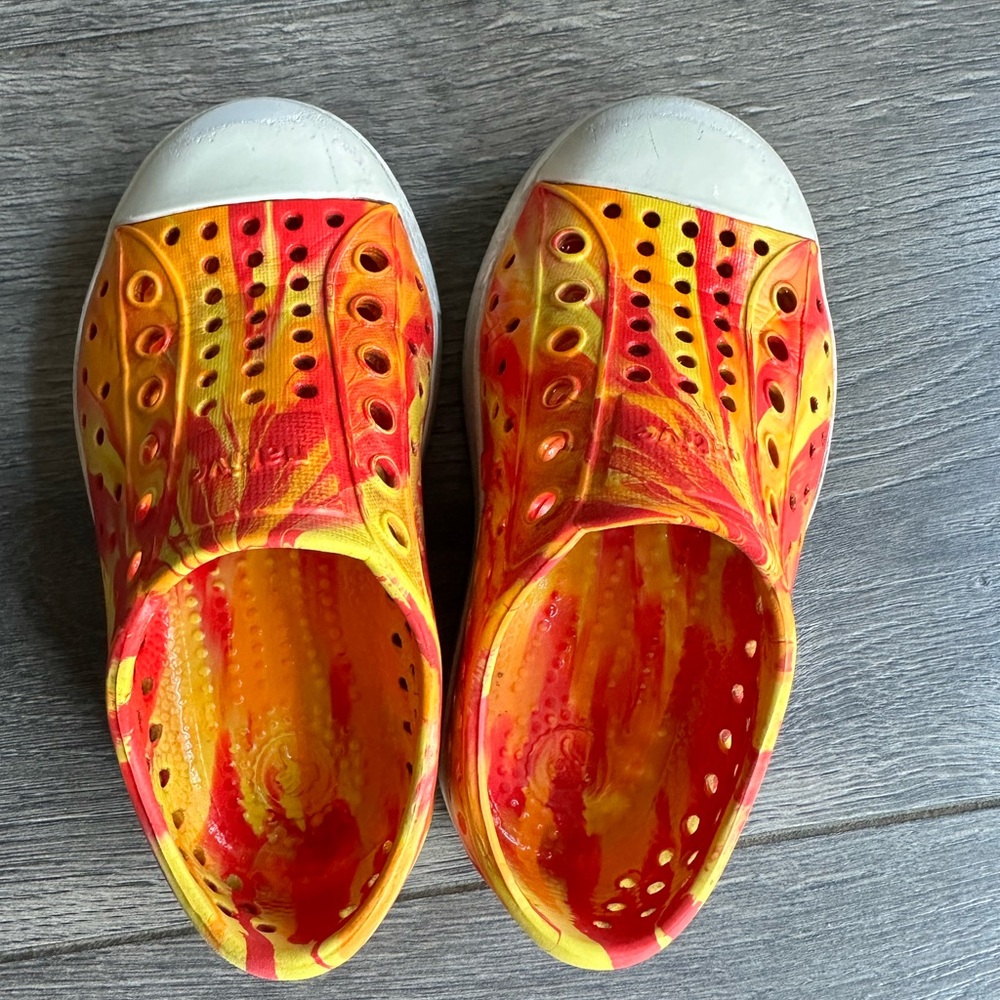 Unisex Native Shoes - yellow and orange tie-dye slip-on sneakers